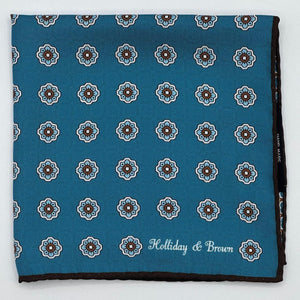Holliday &amp; Brown
Hand-rolled&nbsp;&nbsp;
Holliday &amp; Brown for Cruciani &amp; Bella
100% Silk
Octanium, Light Brown, Sand and White
Double Faces
Motif&nbsp; Pocket Square
Handmade in Italy

32 cm X 32 cm