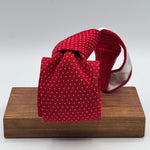 Cruciani &amp; Bella
100% Cotton
Knitted Tie

Red, Light Pink Motif
Handmade in Italy
7,5 cm x 145 cm
New Old Stock