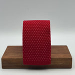 Cruciani &amp; Bella
100% Cotton
Knitted Tie

Red, Light Pink Motif
Handmade in Italy
7,5 cm x 145 cm
New Old Stock