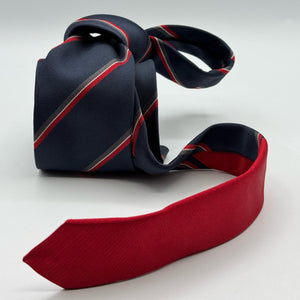 Cruciani &amp; Bella
100% Woven Silk&nbsp;

Crazy Regimental Tie
Tipped&nbsp;
Blue, Grey, Red and White Stripes

Handmade in Italy
8,5 cm x 148 cm
New Old Stock