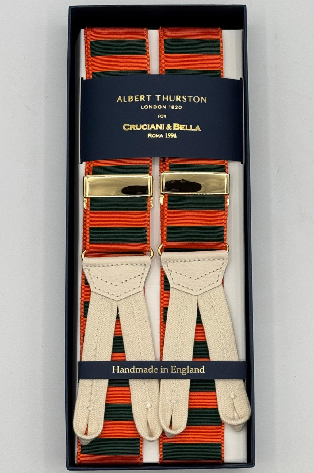 Albert Thurston for Cruciani &amp; Bella
Made in England
Adjustable Sizing
40 mm Woven Barathea&nbsp;
Orange and Green horizontal Stripes Braces
Braid ends
Y-Shaped
Gold Fittings
Size Multifit Adjustable&nbsp;Length:&nbsp;115cm (= 45 inch) Maximum