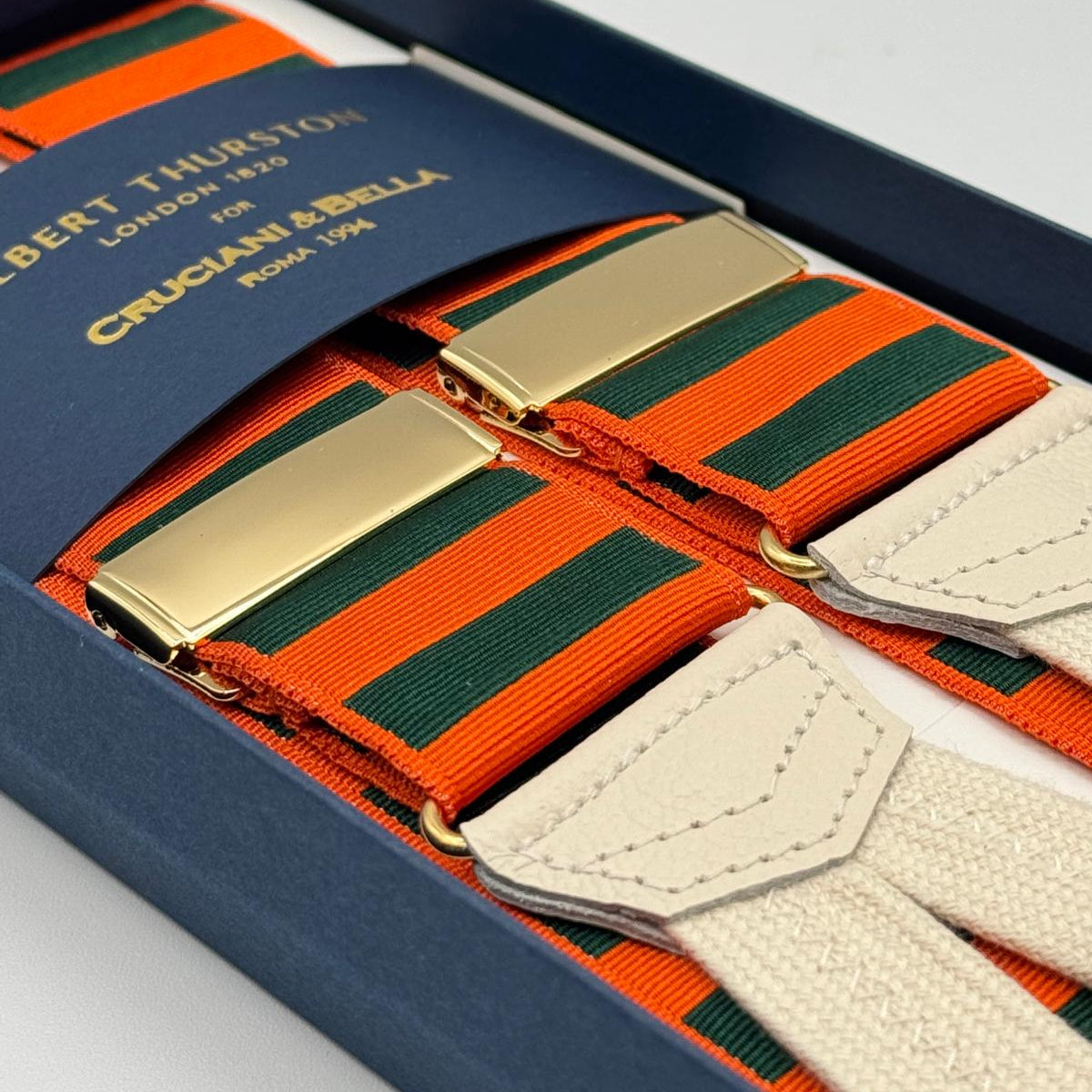 Albert Thurston for Cruciani &amp; Bella
Made in England
Adjustable Sizing
40 mm Woven Barathea&nbsp;
Orange and Green horizontal Stripes Braces
Braid ends
Y-Shaped
Gold Fittings
Size Multifit Adjustable&nbsp;Length:&nbsp;115cm (= 45 inch) Maximum