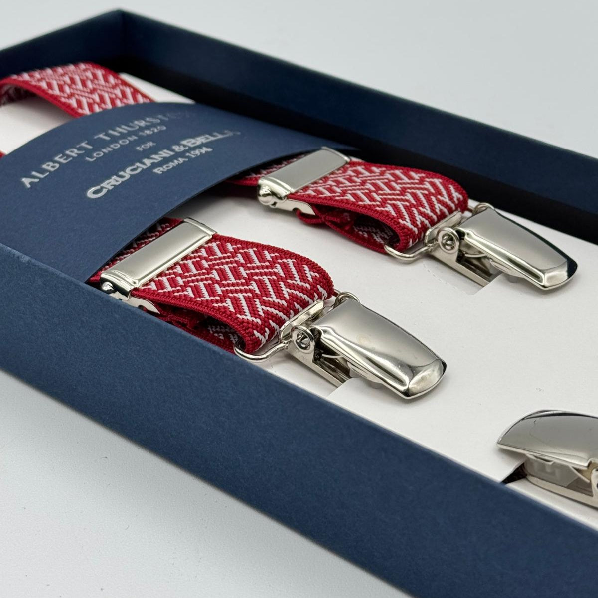 Albert Thurston for Cruciani &amp; Bella

Made in England
Clip on
Adjustable Sizing
25 mm elastic braces
Red and White Motif
X-Shaped
Nickel Fittings
Size: L