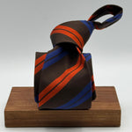 Cruciani &amp; Bella
50% Cotton 50% Silk&nbsp;

Tipped&nbsp;
Brown, Orange and Blue stripes

Handmade in Italy
9 cm x 148 cm
New Old Stock
