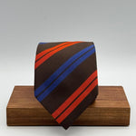 Cruciani &amp; Bella
50% Cotton 50% Silk&nbsp;

Tipped&nbsp;
Brown, Orange and Blue stripes

Handmade in Italy
9 cm x 148 cm
New Old Stock