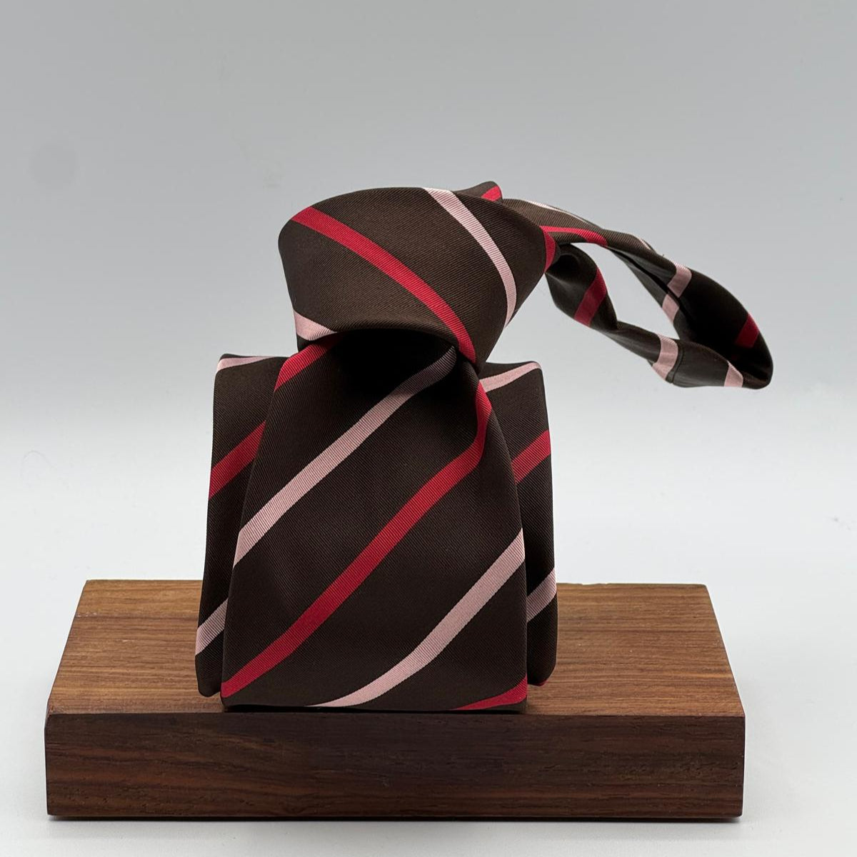 Cruciani &amp; Bella
50% Cotton 50% Silk&nbsp;

Self Tipped&nbsp;
Brown, Pink and Red stripes

Handmade in Italy
9 cm x 148 cm
New Old Stock