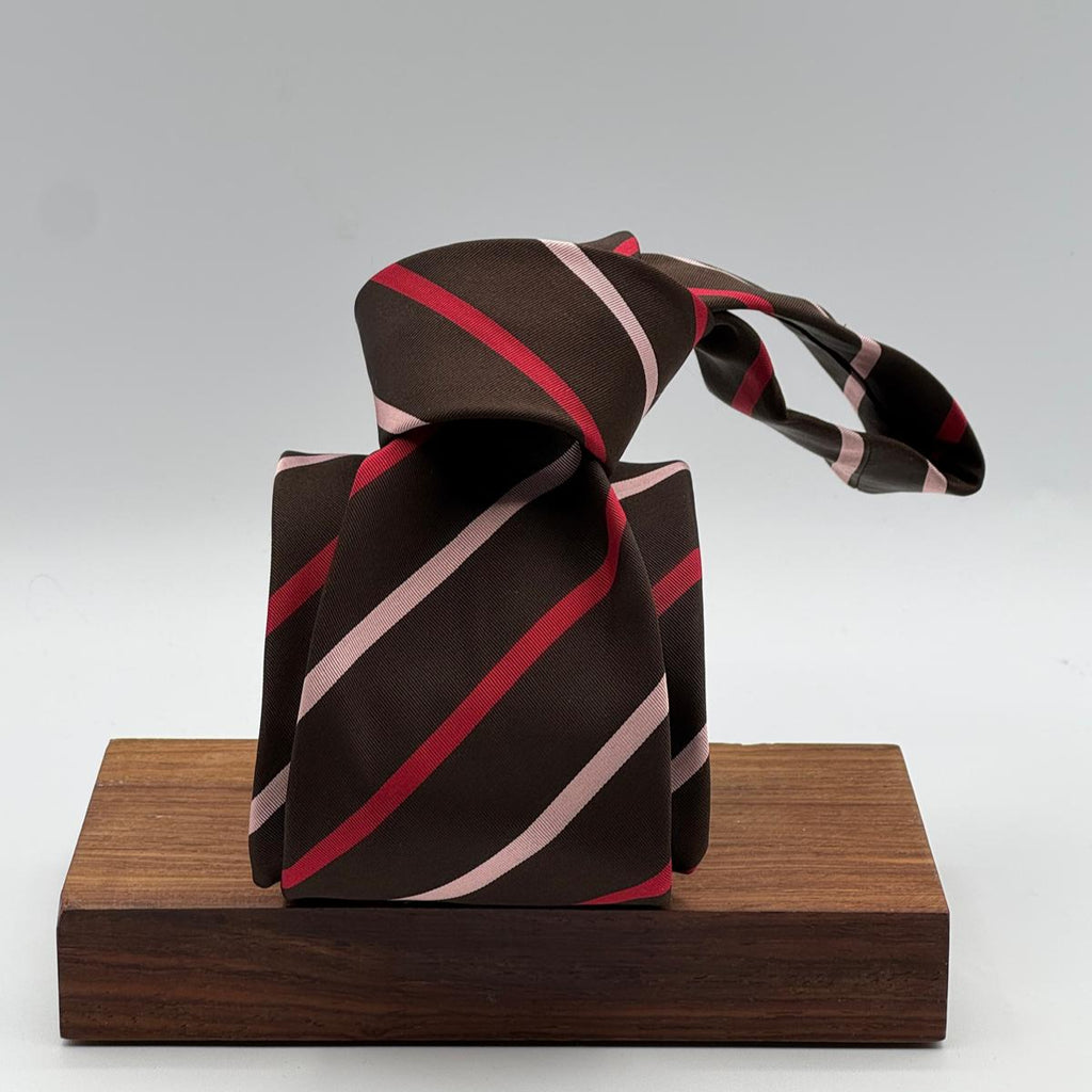 Cruciani &amp; Bella
50% Cotton 50% Silk&nbsp;

Self Tipped&nbsp;
Brown, Pink and Red stripes

Handmade in Italy
9 cm x 148 cm
New Old Stock