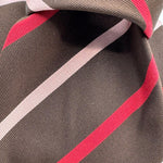 Cruciani &amp; Bella
50% Cotton 50% Silk&nbsp;

Self Tipped&nbsp;
Brown, Pink and Red stripes

Handmade in Italy
9 cm x 148 cm
New Old Stock
