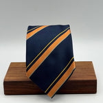 Cruciani &amp; Bella
100% Silk&nbsp;

Self Tipped&nbsp;
Bleu, Orange, Yellow and Tourquoise stripes

Handmade in Italy
9 cm x 148 cm
New Old Stock