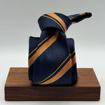 Cruciani &amp; Bella
100% Silk&nbsp;

Self Tipped&nbsp;
Bleu, Orange, Yellow and Tourquoise stripes

Handmade in Italy
9 cm x 148 cm
New Old Stock