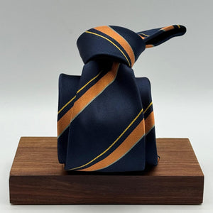 Cruciani &amp; Bella
100% Silk&nbsp;

Self Tipped&nbsp;
Bleu, Orange, Yellow and Tourquoise stripes

Handmade in Italy
9 cm x 148 cm
New Old Stock