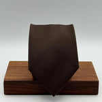 Cruciani &amp; Bella

100% Silk&nbsp;
Tipped
Brown Plain Tie
Handmade in Italy
9 cm x 148 cm
New Old Stock