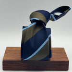 Cruciani &amp; Bella
100% Silk
Tipped
Blue, Green and Light Blue Stripes Tie
Handmade in Italy
8 cm x 148 cm
New Old Stock