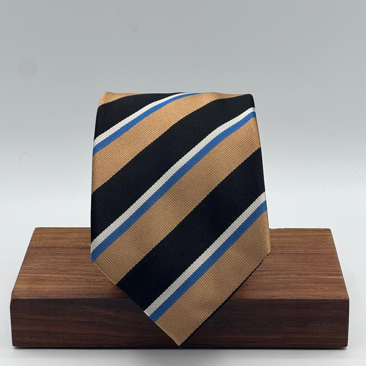 Cruciani &amp; Bella
100% Silk&nbsp;
Woven Jaquard
Self Tipped&nbsp;
Black, Apple Green, Light Blue and Silver Stripes
Handmade in Italy
9 cm x 148 cm
New Old Stock