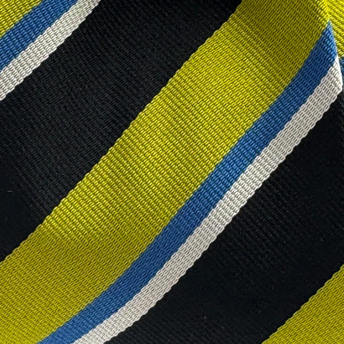 Cruciani &amp; Bella
100% Silk&nbsp;
Woven Jaquard
Self Tipped&nbsp;
Black, Apple Green, Light Blue and Silver Stripes
Handmade in Italy
9 cm x 148 cm
New Old Stock