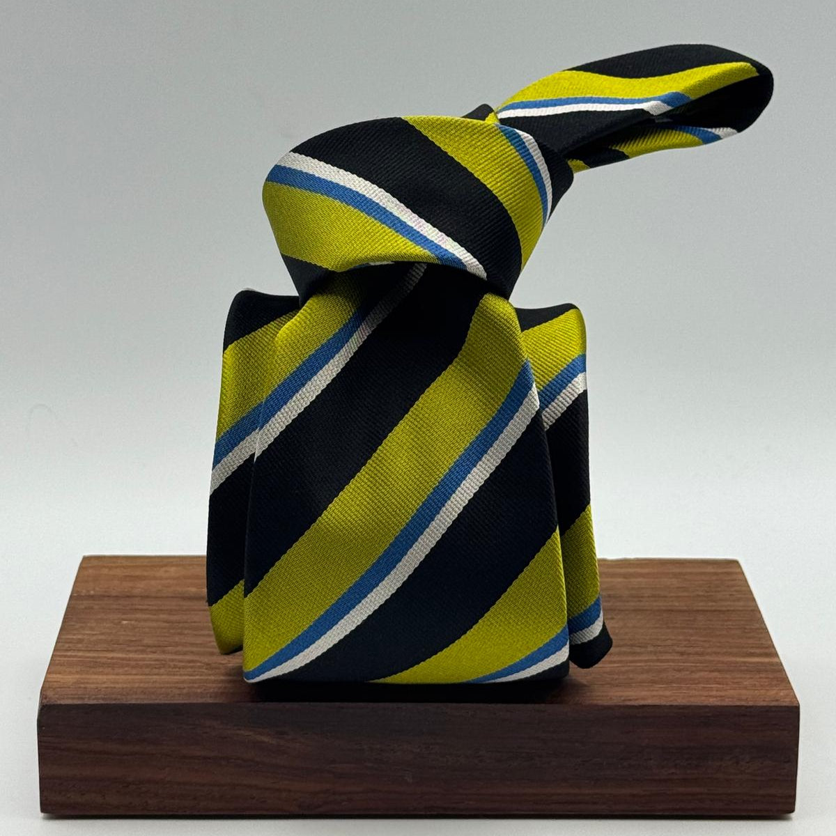 Cruciani &amp; Bella
100% Silk&nbsp;
Woven Jaquard
Self Tipped&nbsp;
Black, Apple Green, Light Blue and Silver Stripes
Handmade in Italy
9 cm x 148 cm
New Old Stock