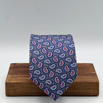 Cruciani &amp; Bella
100% Printed Silk&nbsp;
Tipped
Grey, Light Blue, Pink and White&nbsp;
Paisley Motif Tie
Handmade in Italy
8,5 cm x 148 cm
New Old Stock
