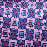Cruciani &amp; Bella
100% Printed Silk&nbsp;
Tipped
Pink, Blue, Light Blue and Red Motif Tie
Handmade in Italy
8,5 cm x 148 cm
New Old Stock