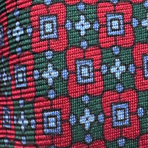 Cruciani &amp; Bella
100% Printed Silk&nbsp;
Tipped
Red, Green and Light Blue Motif Tie
Handmade in Italy
8,5 cm x 148 cm
New Old Stock