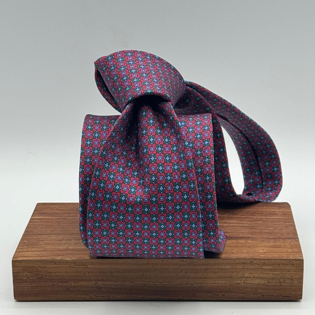 Cruciani &amp; Bella
100% Printed Silk&nbsp;
Tipped
Red, Green and Light Blue Motif Tie
Handmade in Italy
8,5 cm x 148 cm
New Old Stock