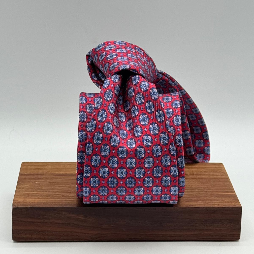 Cruciani &amp; Bella
100% Printed Silk&nbsp;
Tipped
Red, Light Blue and Pink Motif Tie
Handmade in Italy
8,5 cm x 148 cm
New Old Stock