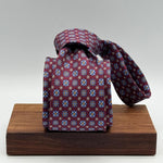 Cruciani &amp; Bella
100% Printed Silk&nbsp;
Tipped
Red Wine, Light Blue, White and Light Brown Motif Tie
Handmade in Italy
8,5 cm x 148 cm
New Old Stock