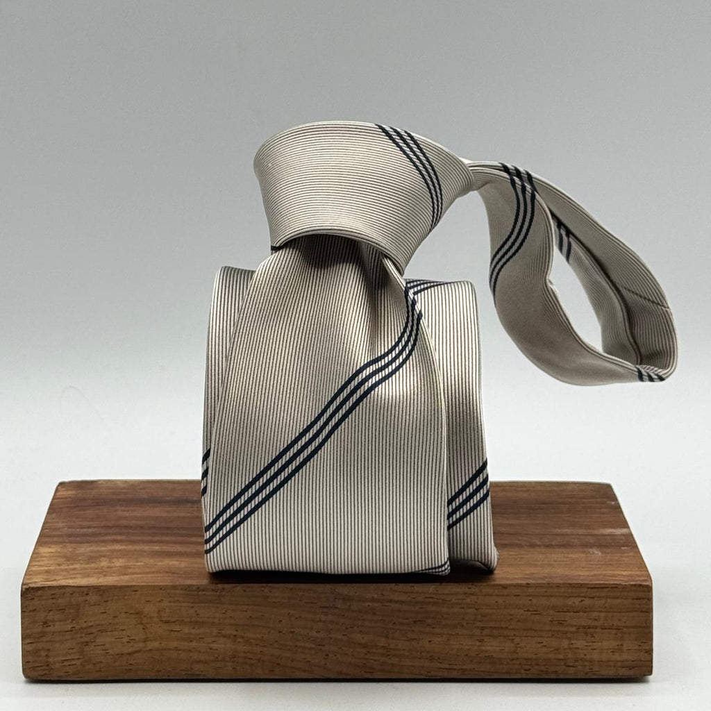 Drake's for Cruciani &amp; Bella
100% Silk

Tipped&nbsp;
Grey and Blue Stripes&nbsp; Tie
Handmade in England
8 cm x 148 cm