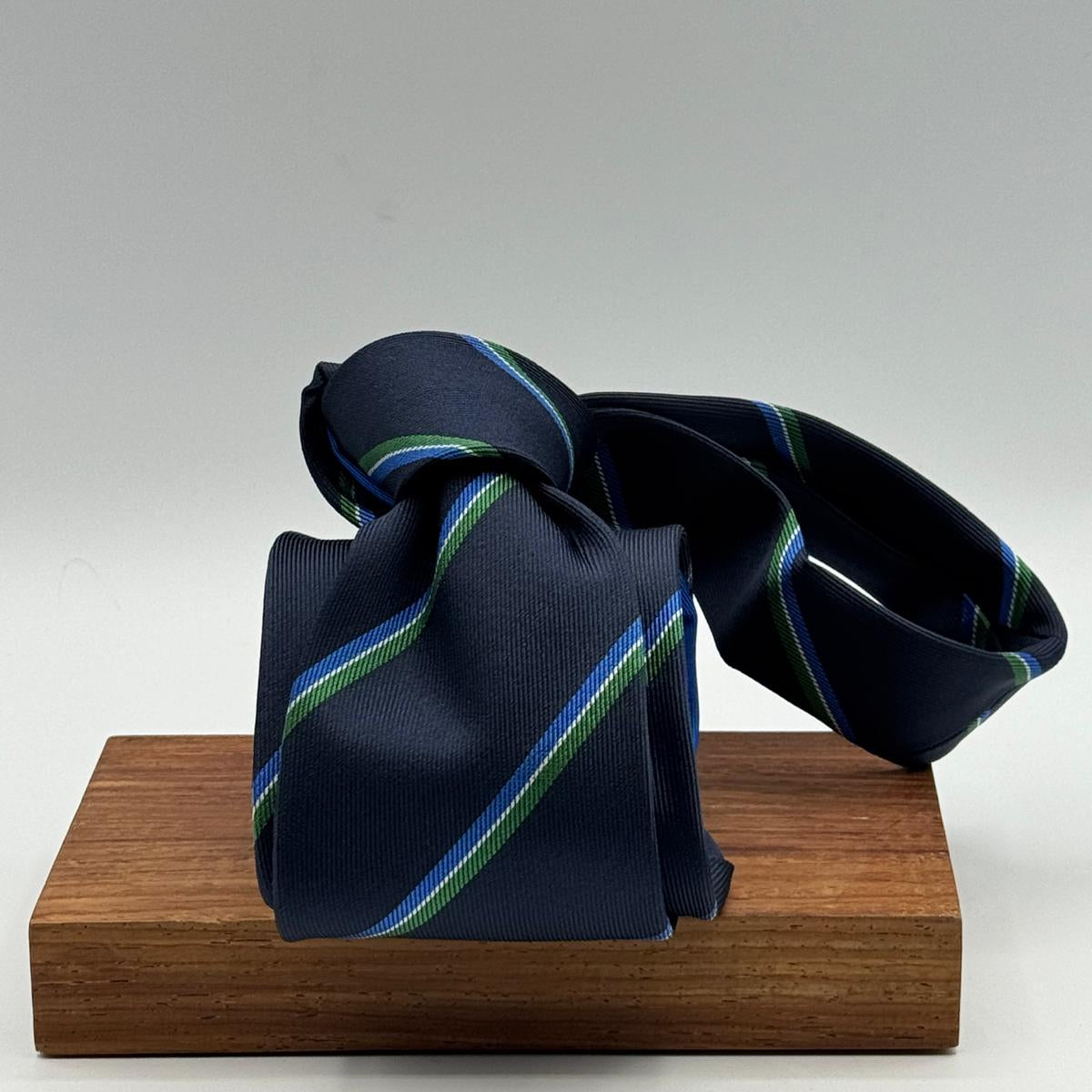Cruciani &amp; Bella
100% Woven Silk&nbsp;

Crazy Regimental Tie
Tipped&nbsp;
Blue, Light Blue, Green, White Stripes

Handmade in Italy
8,5 cm x 148 cm
New Old Stock