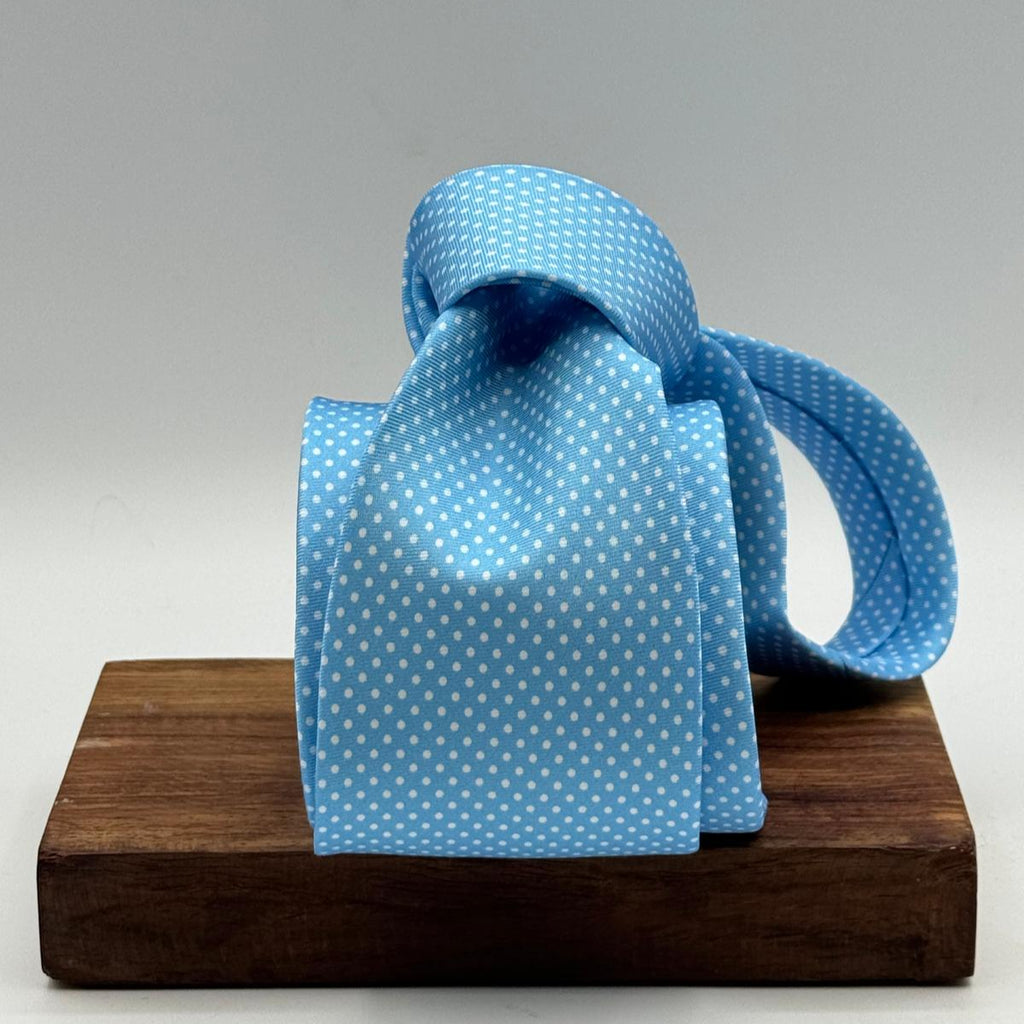 Cruciani &amp; Bella
100% Printed Silk&nbsp;
Tipped
Baby Blue and White Polka Dots Motif Tie
Handmade in Italy
8,5 cm x 148 cm
New Old Stock