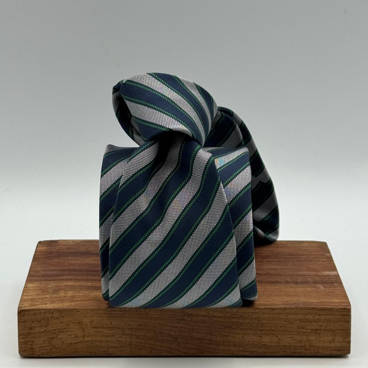 Drake's for Cruciani &amp; Bella
100%&nbsp; Woven Silk
Tipped
Grey, Dark Blue and Green Stripes
Handmade in London, England
8 cm x 150 cm