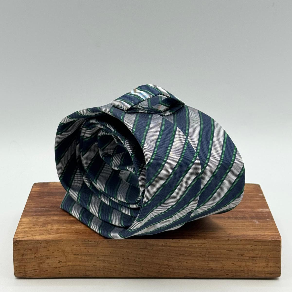 Drake's for Cruciani &amp; Bella
100%&nbsp; Woven Silk
Tipped
Grey, Dark Blue and Green Stripes
Handmade in London, England
8 cm x 150 cm