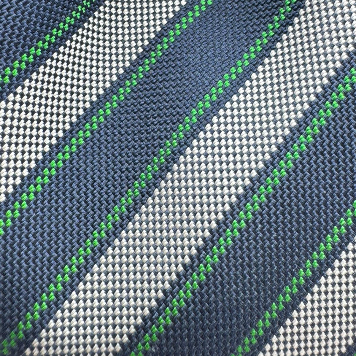 Drake's for Cruciani &amp; Bella
100%&nbsp; Woven Silk
Tipped
Grey, Dark Blue and Green Stripes
Handmade in London, England
8 cm x 150 cm