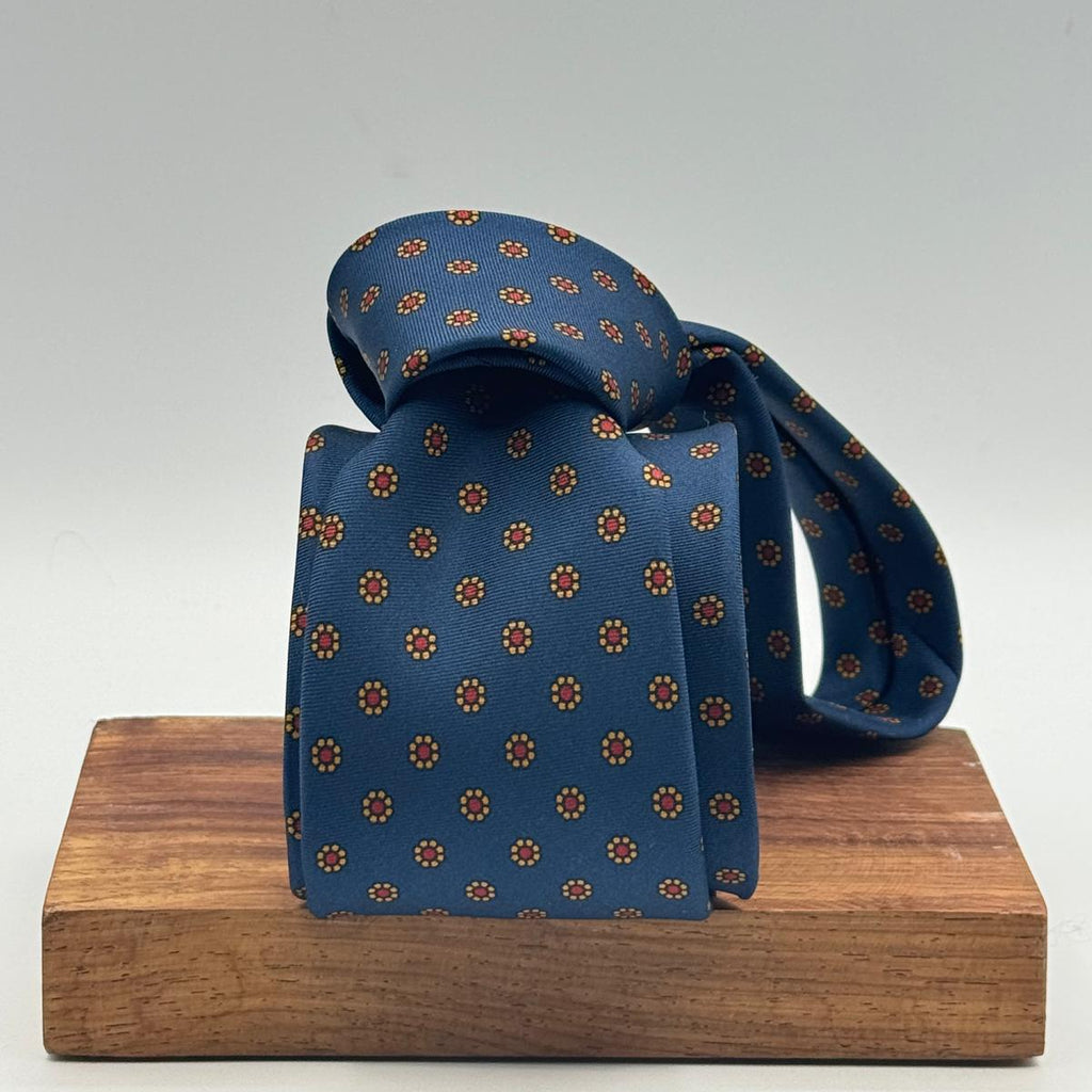 Cruciani &amp; Bella
100% Printed Silk&nbsp;
Tipped
Light Blue, Red and Yellow Floral Motif Tie
Handmade in Italy
8 cm x 148 cm
New Old Stock