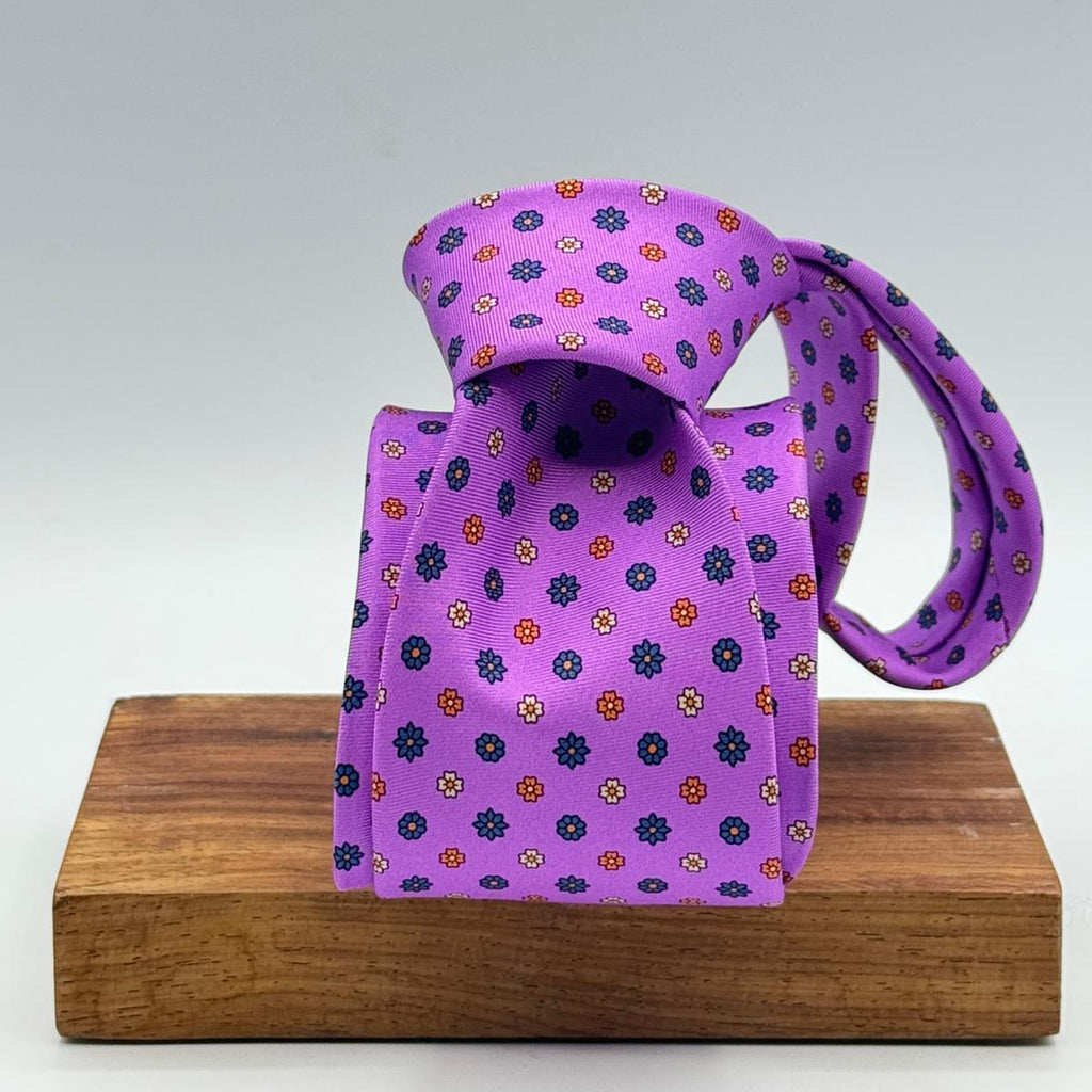 Cruciani &amp; Bella
100% Printed Silk&nbsp;
Tipped
Pink, Blue, Rust and Yellow Floral Motif Tie
Handmade in Italy
8 cm x 148 cm
New Old Stock