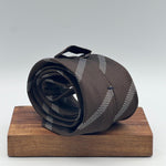 Cruciani &amp; Bella

100% Silk&nbsp;
Self Tipped
Brown and Light Blue Stripe&nbsp;
Handmade in Italy
9 cm x 148 cm
New Old Stock