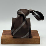 Cruciani &amp; Bella

100% Silk&nbsp;
Self Tipped
Brown and Light Blue Stripe&nbsp;
Handmade in Italy
9 cm x 148 cm
New Old Stock