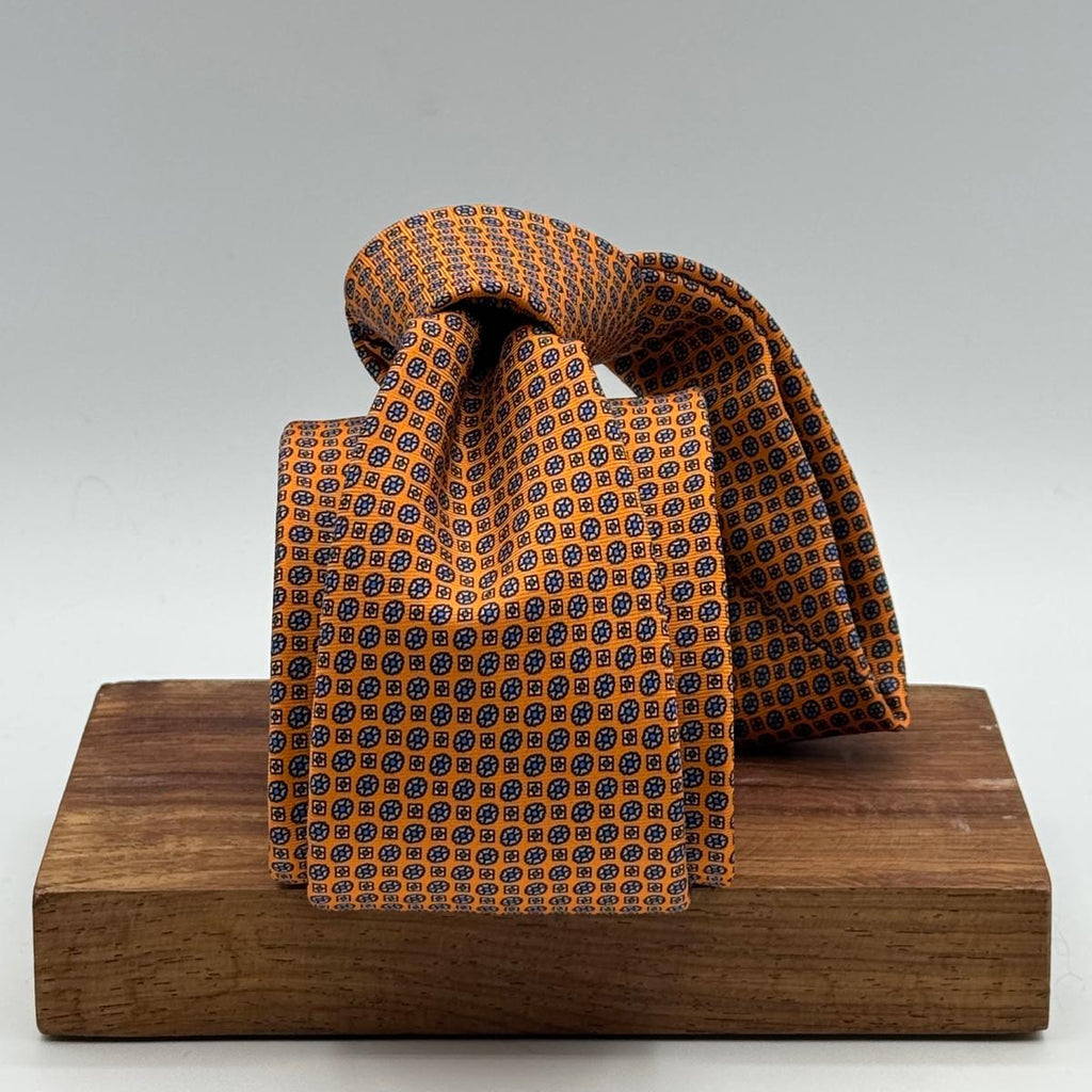 Cruciani &amp; Bella
100% Printed Silk&nbsp;
Tipped
Orange and Light Blue Motif Tie
Handmade in Italy
8 cm x 148 cm
New Old Stock