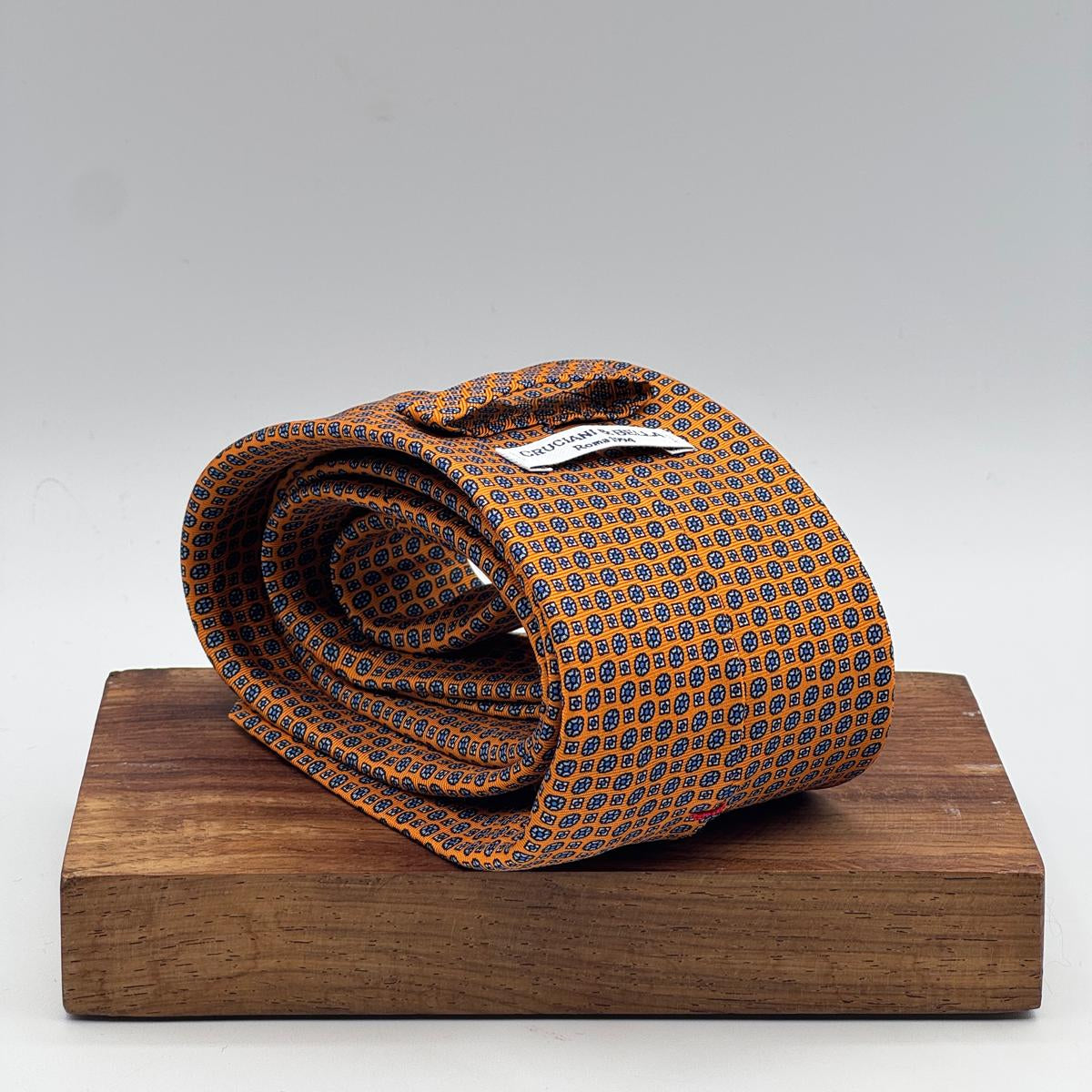 Cruciani &amp; Bella
100% Printed Silk&nbsp;
Tipped
Orange and Light Blue Motif Tie
Handmade in Italy
8 cm x 148 cm
New Old Stock