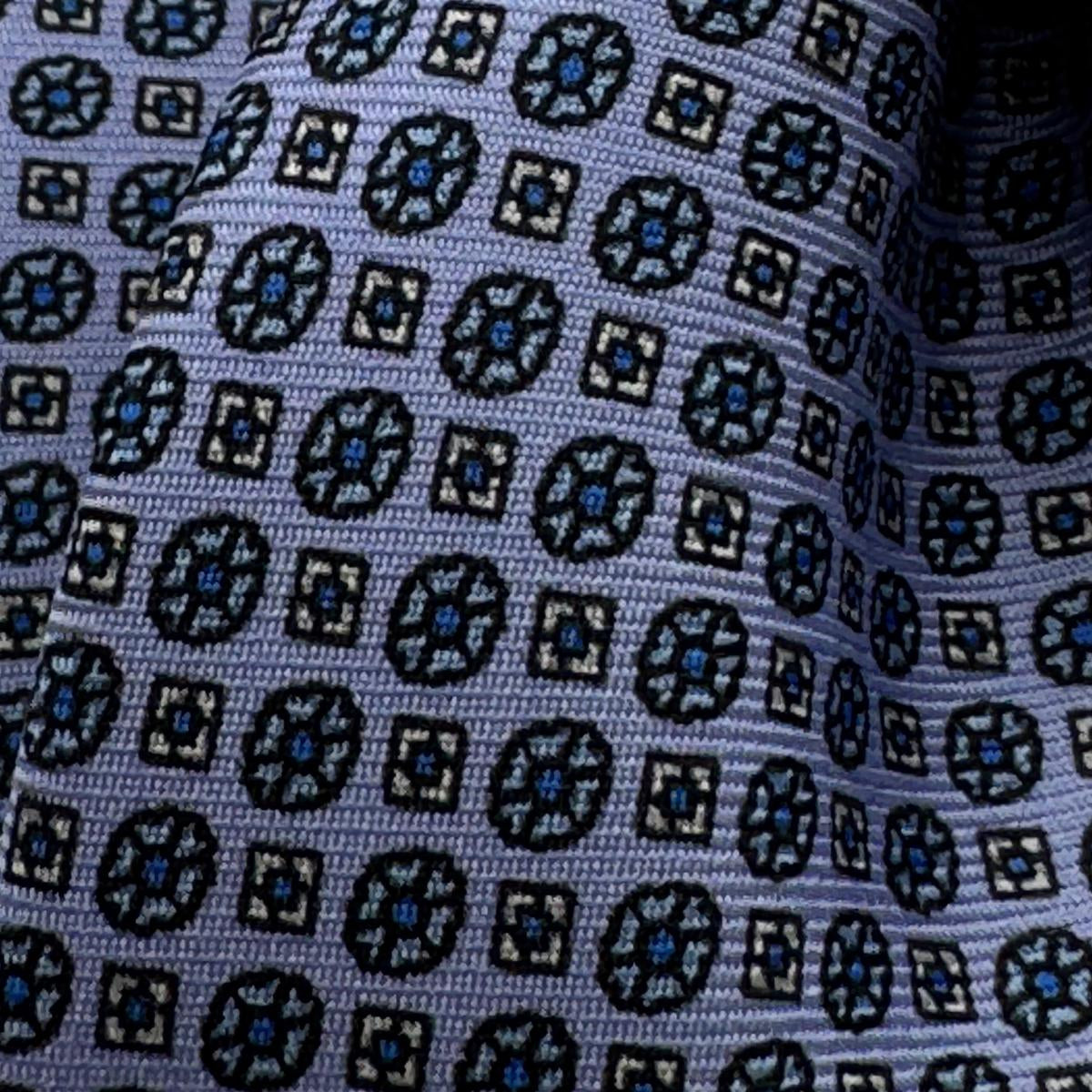 Cruciani &amp; Bella
100% Printed Silk&nbsp;
Tipped
Light Ink Blue and Light Blue Floral Motif Tie
Handmade in Italy
8 cm x 148 cm
New Old Stock