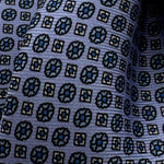 Cruciani &amp; Bella
100% Printed Silk&nbsp;
Tipped
Light Ink Blue and Light Blue Floral Motif Tie
Handmade in Italy
8 cm x 148 cm
New Old Stock