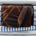 Holliday &amp; Brown
Hand-rolled&nbsp;&nbsp;
Holliday &amp; Brown for Cruciani &amp; Bella
100% Silk
Blue, Wine Green and Brown
Double Faces
Bra Motif&nbsp; Pocket Square
Handmade in Italy

32 cm X 32 cm