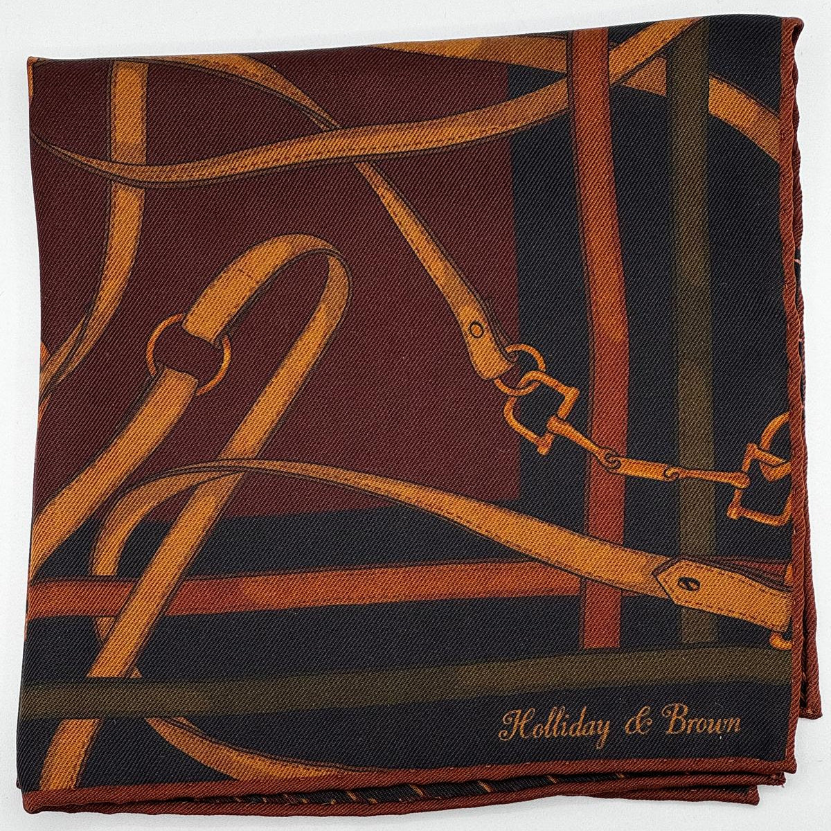 Holliday &amp; Brown
Hand-rolled&nbsp;&nbsp;
Holliday &amp; Brown for Cruciani &amp; Bella
100% Silk
Blue, Wine Green and Brown
Double Faces
Bra Motif&nbsp; Pocket Square
Handmade in Italy

32 cm X 32 cm