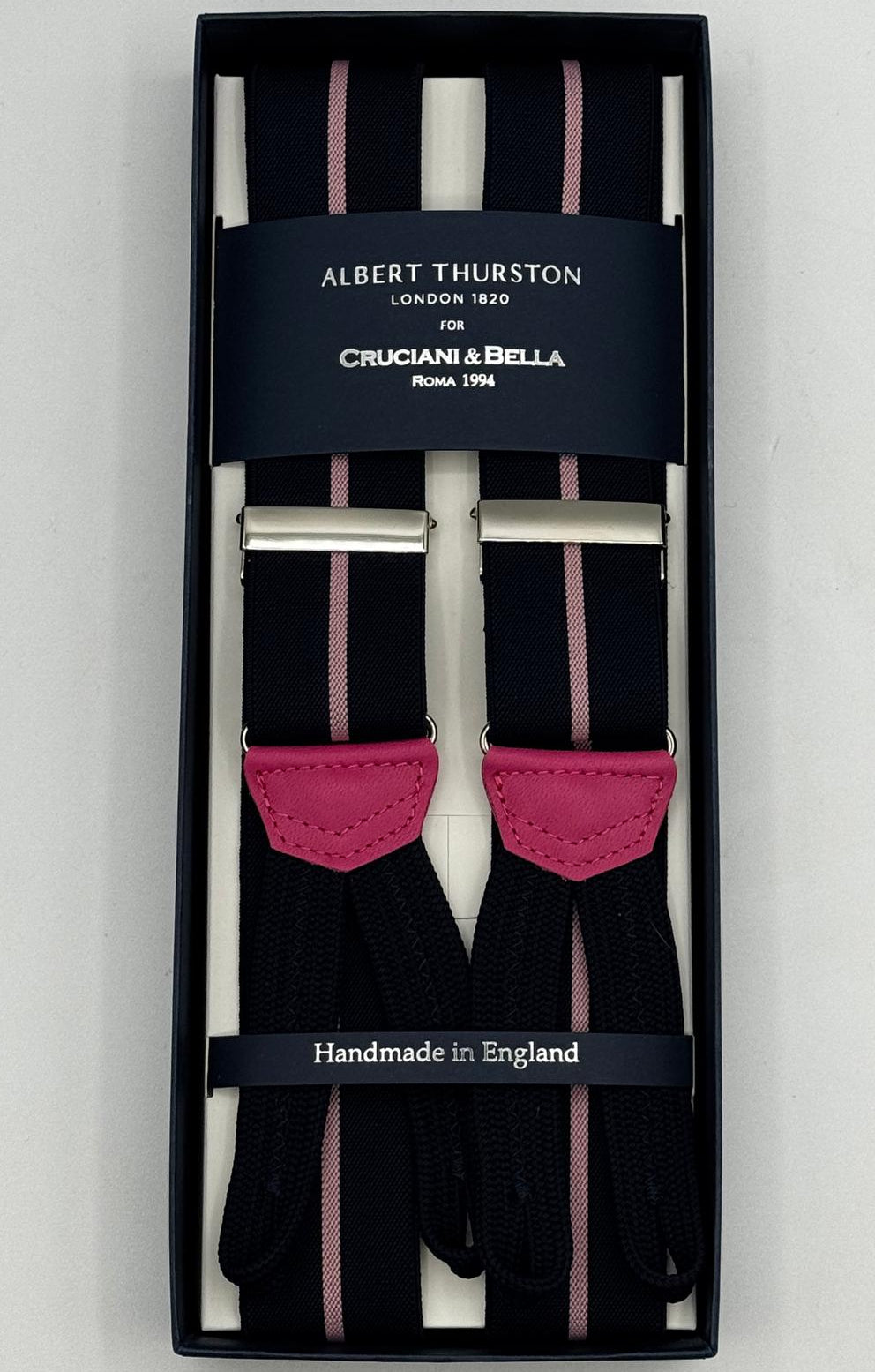 Albert Thurston for Cruciani &amp; Bella
Made in England
Adjustable Sizing
35 mm elastic Blue and Pink Stripe braces
Braid ends
Y-Shaped
Nickel Fittings
Size Multifit Adjustable&nbsp;Length:&nbsp;115cm (= 45 inch) Maximum