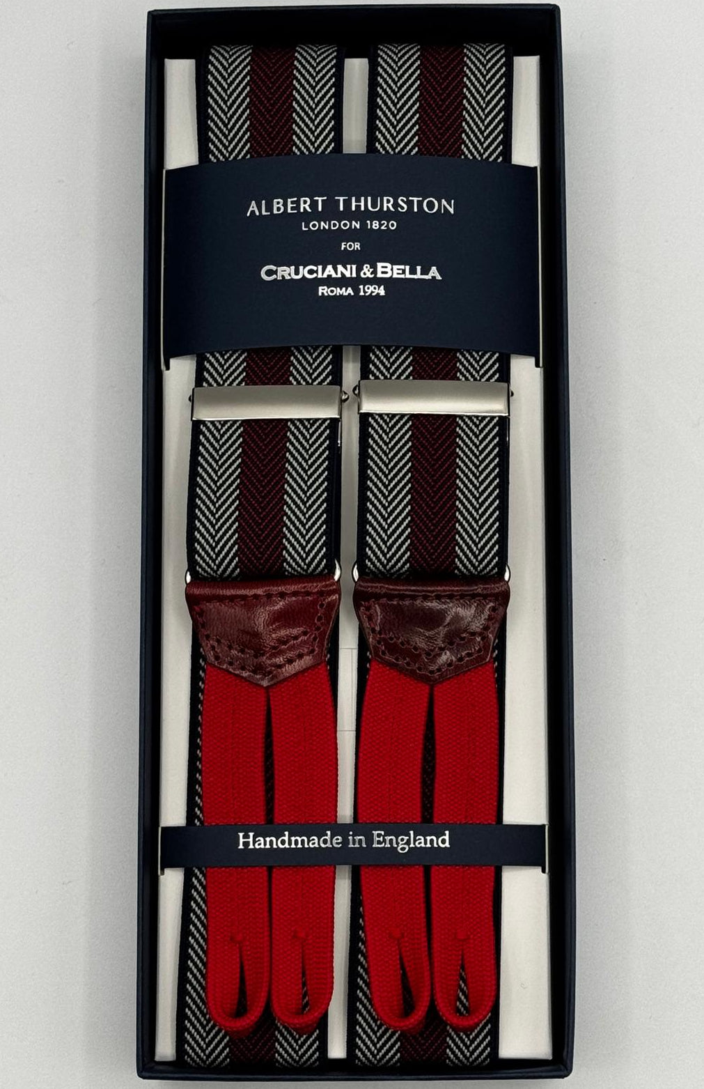 Albert Thurston for Cruciani &amp; Bella
Made in England
Adjustable Sizing
35 mm elastic Blue, Wine and Grey Stripe braces
Braid ends
Y-Shaped
Nickel Fittings
Size Multifit Adjustable&nbsp;Length:&nbsp;115cm (= 45 inch) Maximum