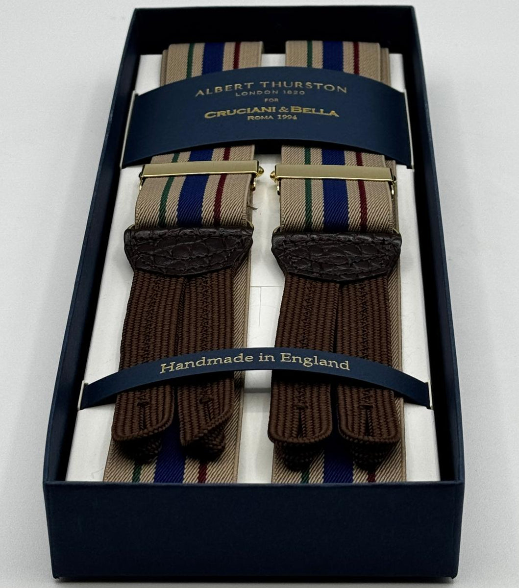 Albert Thurston for Cruciani &amp; Bella
Made in England
Adjustable Sizing
35 mm elastic Hazelnut, Red, Blue and Grey Stripes braces
Braid ends
Y-Shaped
Gold Fittings
Size Multifit Adjustable&nbsp;Length:&nbsp;115cm (= 45 inch) Maximum