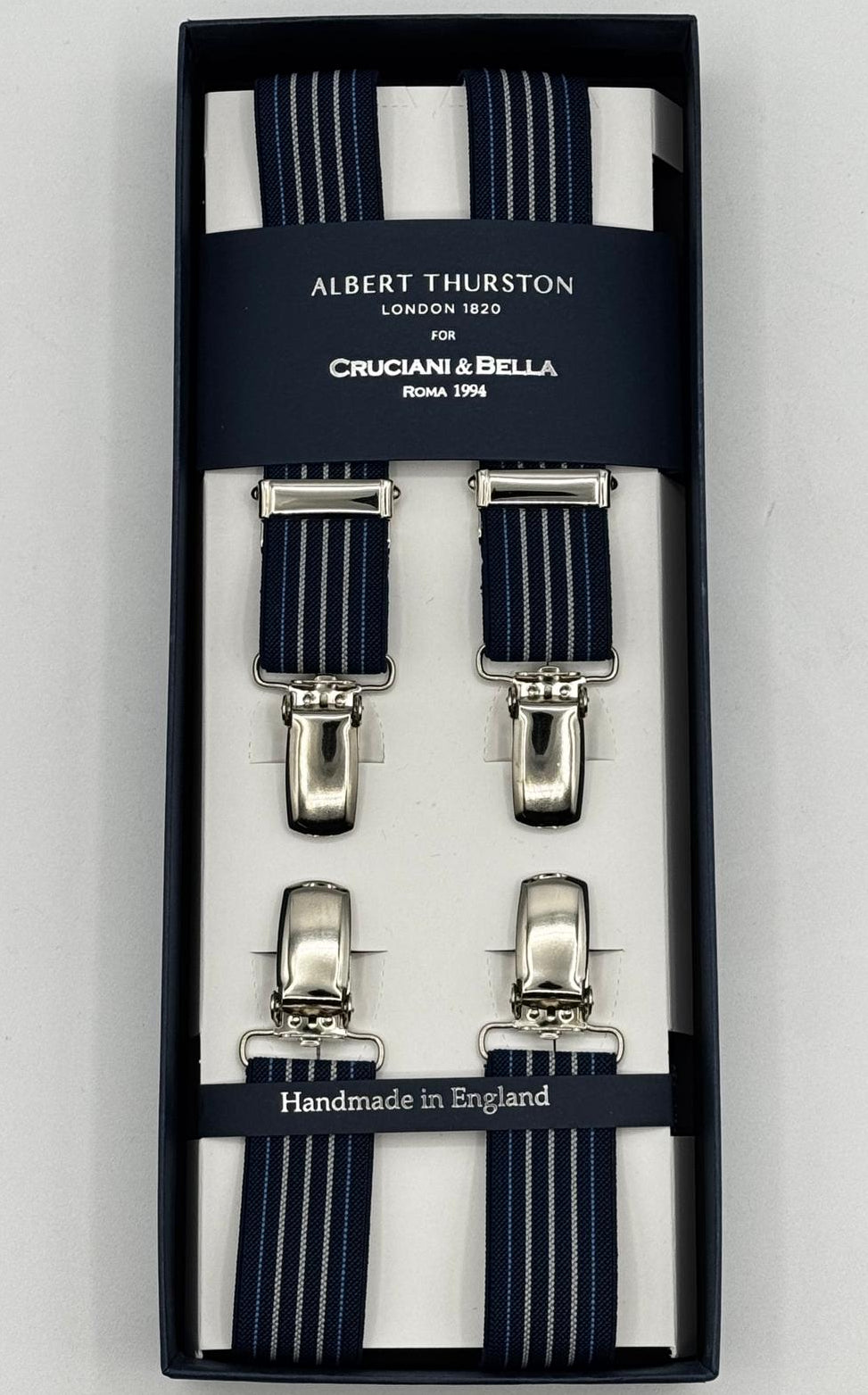 Albert Thurston for Cruciani &amp; Bella

Made in England
Clip on
Adjustable Sizing
25 mm elastic braces
Blue, Light Blue and White Stripes
X-Shaped
Nickel Fittings
Size Multifit Adjustable&nbsp;Length:&nbsp;115cm (= 45 inch) Maximum