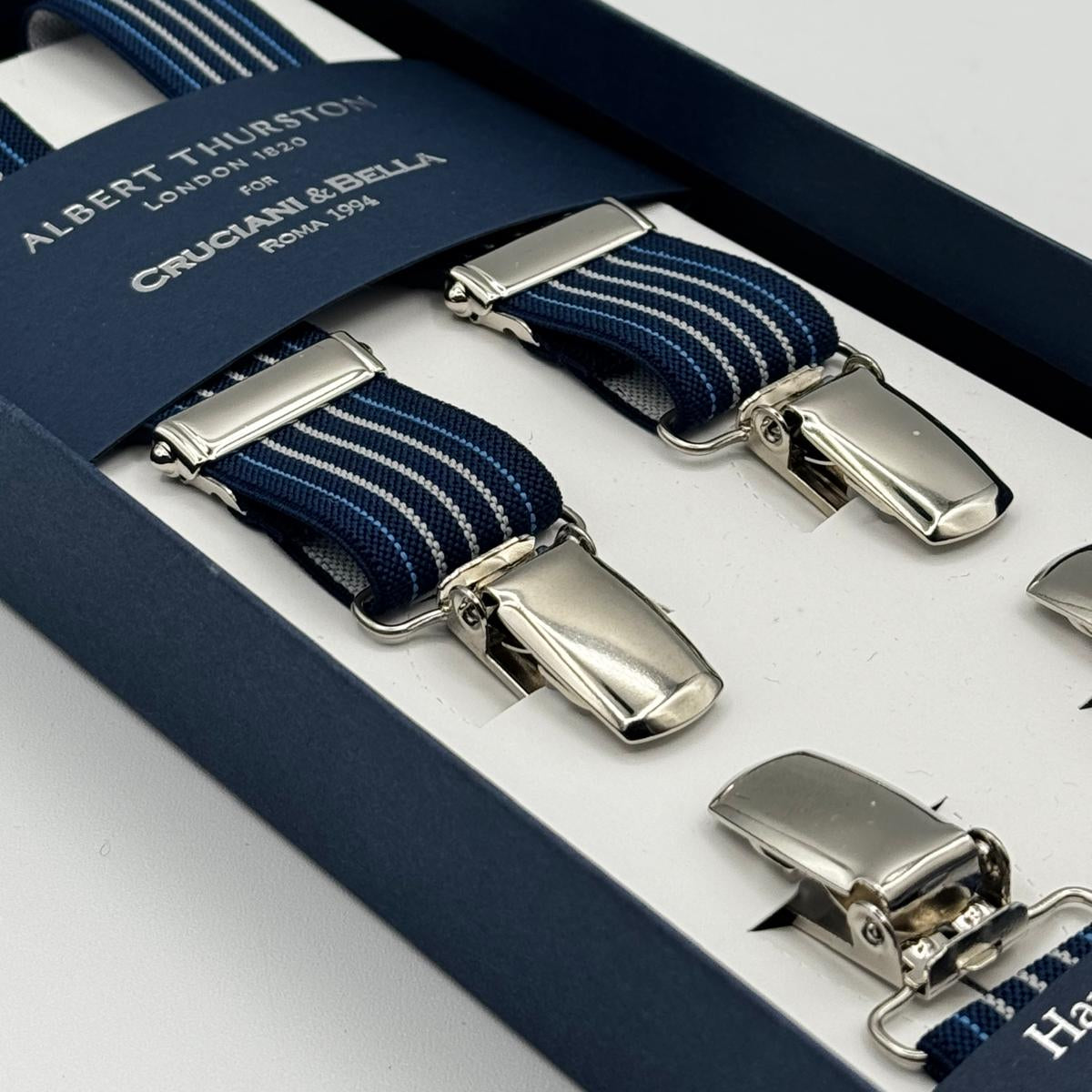 Albert Thurston for Cruciani &amp; Bella

Made in England
Clip on
Adjustable Sizing
25 mm elastic braces
Blue, Light Blue and White Stripes
X-Shaped
Nickel Fittings
Size Multifit Adjustable&nbsp;Length:&nbsp;115cm (= 45 inch) Maximum