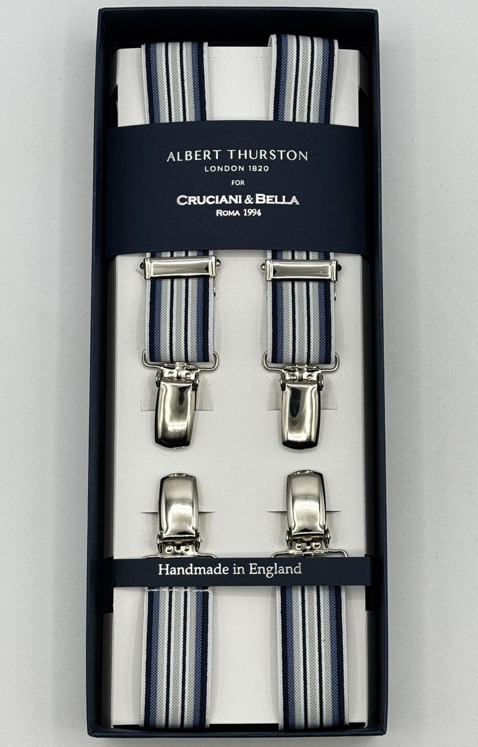 Albert Thurston for Cruciani &amp; Bella

Made in England
Clip on
Adjustable Sizing
25 mm elastic braces
Blue, Light Blue and White Stripes
X-Shaped
Nickel Fittings
Size Multifit Adjustable&nbsp;Length:&nbsp;115cm (= 45 inch) Maximum