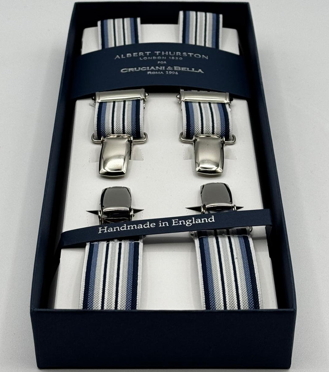 Albert Thurston for Cruciani &amp; Bella

Made in England
Clip on
Adjustable Sizing
25 mm elastic braces
Blue, Light Blue and White Stripes
X-Shaped
Nickel Fittings
Size Multifit Adjustable&nbsp;Length:&nbsp;115cm (= 45 inch) Maximum