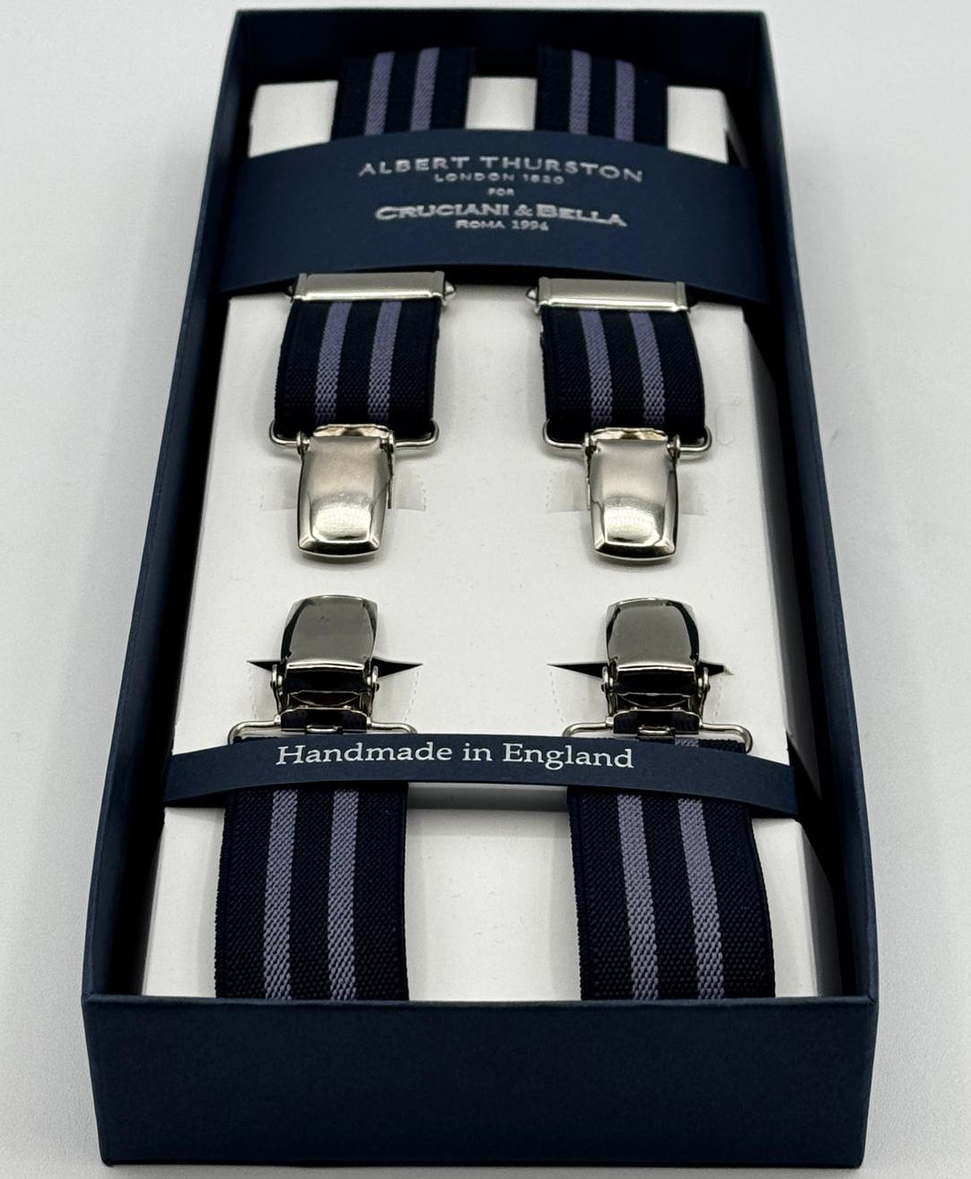 Albert Thurston for Cruciani &amp; Bella

Made in England
Clip on
Adjustable Sizing
25 mm elastic braces
Blue and Violet Stripes
X-Shaped
Nickel Fittings
Size Multifit Adjustable&nbsp;Length:&nbsp;115cm (= 45 inch) Maximum